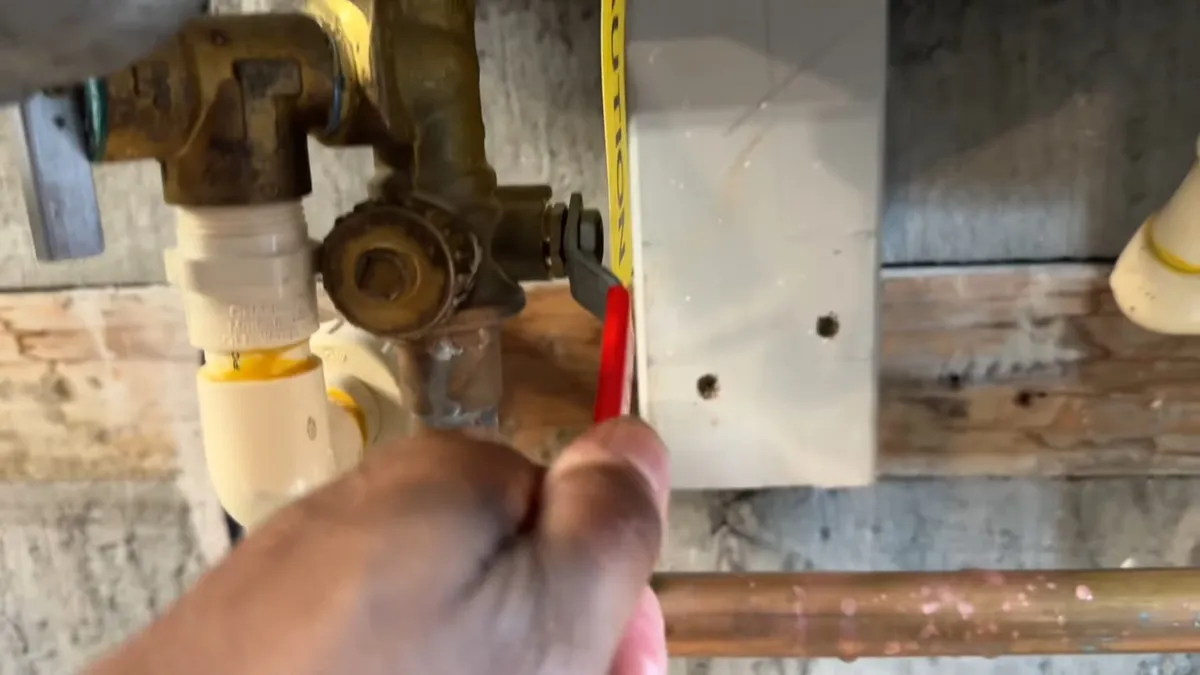 Tankless water heater flush hoses connected for descaling service illustrating tankless water heater in surprise az: when to switch